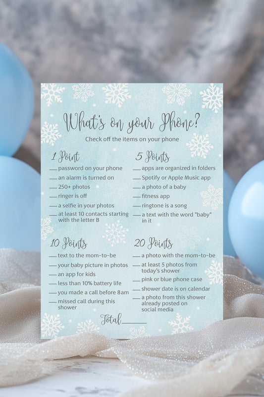 Baby shower game card titled 'What's on your Phone?' with blue balloons in the background.